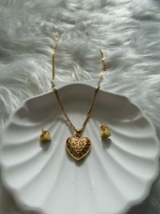 Discover the allure of the Filigree Locket Heart Necklace stainless